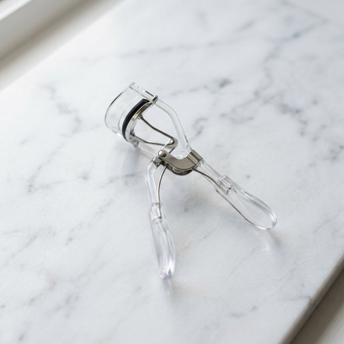 Eyelash curler with built-in comb - photo 1